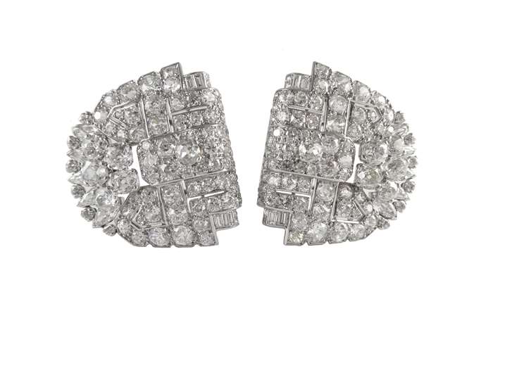 Pair of Art Deco diamond cluster half-moon clip brooches by Cartier, London,
